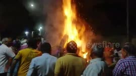 Hindu Devotees Gather Around Bonfire To Pray And Perform Rituals For Holika Dahan In Rajasthan, India