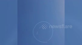 Japanese air racing world champion draws a smile in the sky
