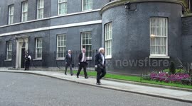 UK Prime Minister Boris Johnson leaves Number 10 to lead the press conference at 9 Downing Street