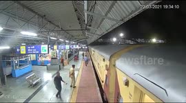 Saree-clad woman saved after she falls while getting off train