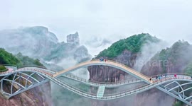 Extraordinary 140-metre-high glass bridge in China is not for the fainthearted