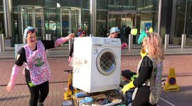 Extinction Rebellion ‘Dirty Scrubbers’ Barclays Bank demo, London, UK