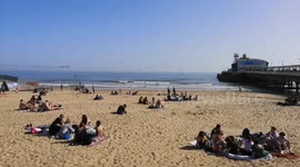 Sun seekers hit Bournemouth beach as UK records highest March temperature for 53 years