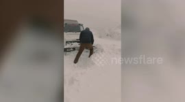 Army free cars stuck in snow in northern India's Ladakh territory