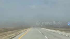 Windy weather reduces visibility in North Dakota