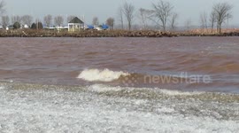 This is awesome waves and ice crashing against the Lake Superior shore in Ashland