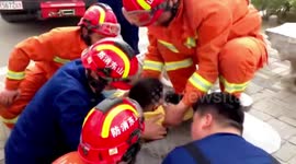 Chinese firefighters rescue 6-year-old boy trapped in hole on stone table
