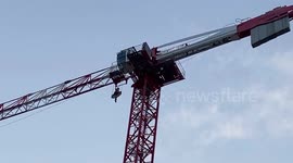 Protester climbs tower crane east London channing town