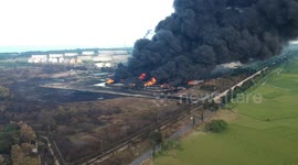 Thick clouds of black smoke emitted as oil refinery in Indonesia continues to burn