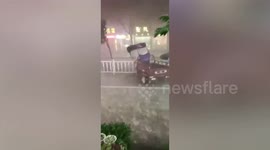 Powerful winds and hailstones wreak havoc in southern Chinese city
