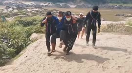 Thai soldiers help injured Burmese refugees fleeing airstrikes in Myanmar