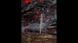 Iceland Volcanic Eruption - Moving lava burns stick