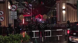 Militant attacks continue in Jakarta; woman points gun, shot dead at Indonesian police HQ
