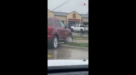 'Ford Driver Struggles While Exiting Restaurant via the Entrance'