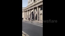 UK: Climate Activists Splash Fake Oil At Bank Of England Building In London
