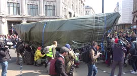ARCHIVE: Climate change protesters bring London's Oxford Circus to standstill with pink boat