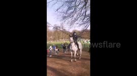 Belgian police on horseback disperse riot crowds at Brussels park