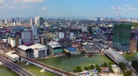 Drone video of almost empty streets of Manila and people praying outside churches despite of lockdown