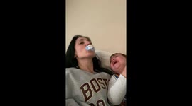 Toddler Giggles Uncontrollably at Mummy Being Silly with his Dummy.