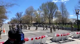 Suspect and officer both reported dead after car rammed into barricade at Capitol; National Guard set up defensive perimeter