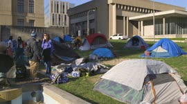 Kansas City Homeless Union leader Quadafi Shelby speaks to supporters at rally in Kansas City, Missouri
