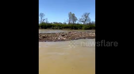 Island of trash on the Cumberland River after heavy floods in Nashville, Tennessee