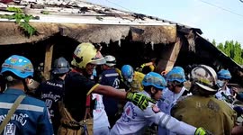 Rescue teams in Bangkok, Thailand search for survivors after building collapses