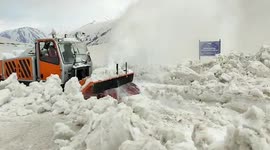 Local authorities carry out snow clearing operations in northern India