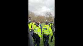 Tensions during Piers Corbyn speech at Hyde Park as police lead Antifa man away