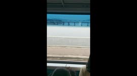 Go Way by Subway crossing the bridge at the window in the early morning