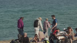 La Barceloneta beach remains busy despite new mask regulations
