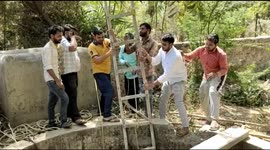 Indian villagers rescue monkey from bottom of deep well