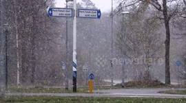 Netherlands enjoy strange snowfall in springtime
