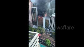 Philippines: Thick Smoke Billows As Fire Rages At High-Rise In Makati CBD, Metro Manila 2