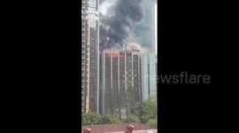 Philippines: Thick Smoke Billows As Fire Rages At High-Rise In Makati CBD, Metro Manila