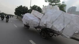 Ridiculously overloaded motorbike spotted on Vietnamese road