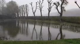 France: Unusual Cold Air Mass Brings April Snow Over Country 2
