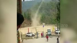 Panic ensues as locals spot whirlwind sweeping through school playground in India