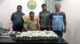 Police officials seize cash worth $1,88,550 in southern India