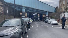 Truck removed after becoming lodged underneath railway bridge in Camden, London