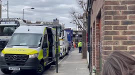 Lorry stuck under railway bridge in Camden reverses with help from recovery vehicle