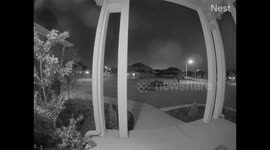'Drunk driver' caught on front porch Nest camera. Drives onto sidewalk and misses parked car by inches. Pops tire when hits curb.