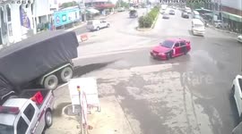 Truck loses brakes and flips over before hitting police station
