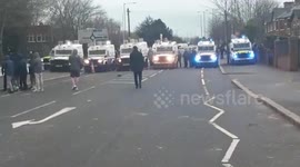 Footage shows riot police charging at demonstrators in Belfast