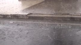 Tropical rainstorms cause flash floods in Thailand as rainy season approaches