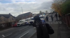 Violent protests in Belfast draw riot police