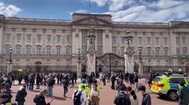People arrive to leave flowers on the death of Prince Philip