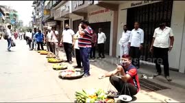 Jewellers in India protest over Covid rules by selling VEGETABLES on the street