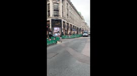Police Vans rushing down Regent Street in reaction to Anti-Lockdown Protesters