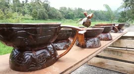 an old man, a coconut shell waste craftsman